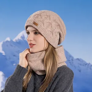 Winter thermal knit beanie and neck warmer set in beige, shown against snowy background