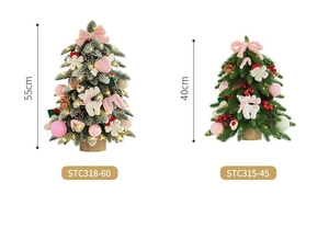 Nordic mini flocked Christmas trees with pink ornaments and warm LED lights on wood base