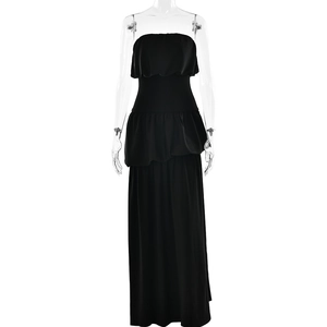 Elegant strapless black maxi dress featuring layered ruffles and high waist slit detail
