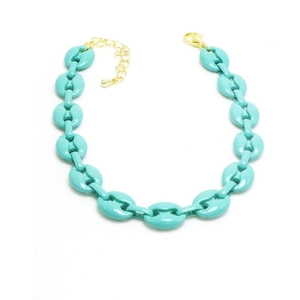 Close-up of turquoise pig nose chain links with golden lobster clasp and adjustable extender
