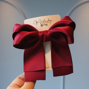 Classic wine red satin bow hair clip for girls with elegant layered ribbon design