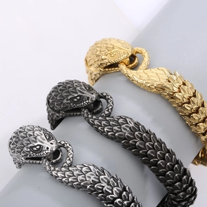 Punk style snake scale bracelets in gold, antique silver, and polished steel finishes