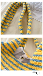 Close-up of yellow and blue striped fleece tote bag showing metal button and lining