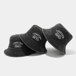 Three stacked vintage washed cotton bucket hats with detailed Limited Edition embroidery