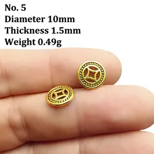 Detailed close-up of a 10mm golden coin spacer with traditional embossed patterns