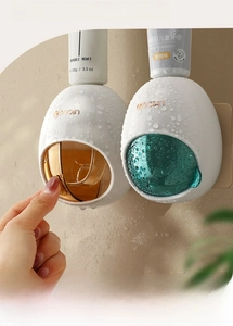 Macro detail of waterproof wall-mounted automatic toothpaste dispenser with sealing design