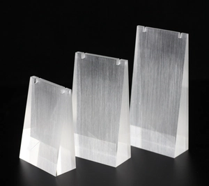 Three-piece frosted acrylic necklace display stands in tiered heights for jewelry pendant storage