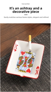 Close-up of rectangle ceramic ashtray with King of Hearts poker card design on a table