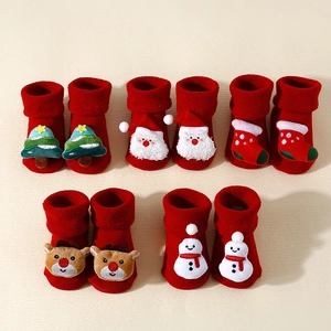 5-pack red Christmas baby socks with 3D Santa, reindeer, and snowman plush motifs