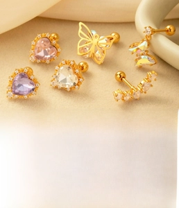 Detailed view of titanium steel heart and butterfly cartilage earrings with zircon