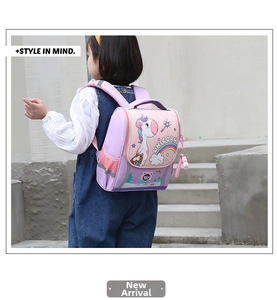 Pink and purple unicorn school bag with side mesh pocket and cute plush pendant