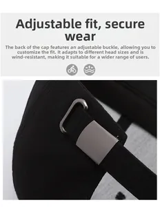 Detail of adjustable metal buckle and cotton twill fabric on the black baseball cap