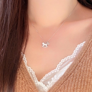 Elegant zircon and shell pony pendant necklace on a delicate silver chain for women