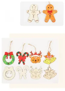 Various styles of laser-cut wooden Christmas ornaments with painted and natural finishes