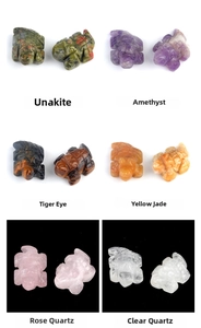 Miniature turtles carved from amethyst, rose quartz, and assorted natural gemstones