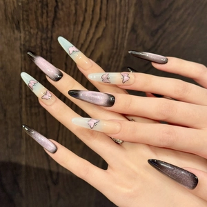 Detail of dark purple cat-eye press-on nails with 3D butterfly design and glitter gradient