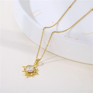 Polished gold stainless steel north star pendant necklace with cubic zirconia on ceramic plate