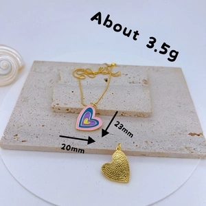 Detailed size view of gold heart pendant necklace with dimensions and weight info