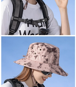 Detailed view of tie-dye sun hat with adjustable wind cord in pink and coffee