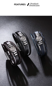 Gros plan de bracelets multicouches en cuir tressé avec breloques Viking vintage