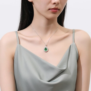 Elegant water drop green gemstone pendant necklace in S925 silver on female model
