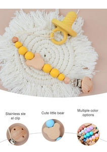 Baby pacifier set with yellow silicone beads, wooden bear clip, and stainless steel parts