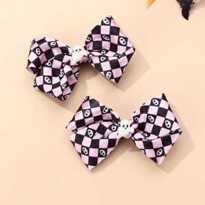 Pink and black checkered bow hair clips with white ghosts for Halloween parties