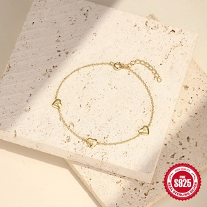Minimalist S925 sterling silver heart bracelet with sparkling zircon stones in gold finish