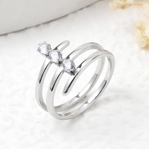 Polished silver stainless steel multi-layer spiral ring with three round clear gems