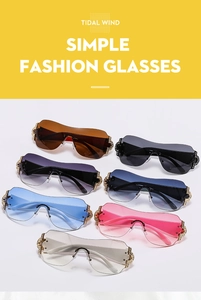 Close-up of Y2K rimless shield sunglasses featuring rhinestone detailing on the temples