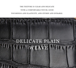 Detailed close-up showing the clear crocodile texture and fine stitching on black leather
