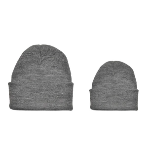 Matching set of grey knit beanies for parent and child in warm minimalist winter style