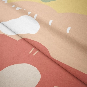 Close-up of bohemian wall tapestry showing soft plush texture and abstract color blocks