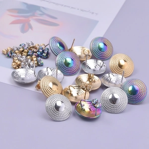 Detailed view of 304 stainless steel round textured stud earrings in gold, silver and rainbow