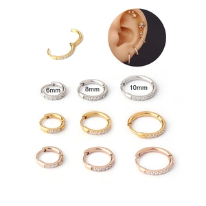 Stainless steel hoop earrings with cubic zirconia in gold, silver, and rose gold finishes