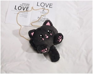 Detailed close-up of dark grey plush cat bag with premium golden metal chain strap