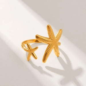 Golden starfish open ring in stainless steel with detailed textured sea star design