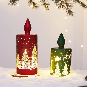 Festive Christmas LED candle lights with gold reindeer patterns in warm yellow glow