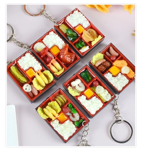 Set of five miniature Japanese bento box keychains with detailed food models