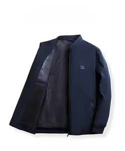 Detail of dark blue stand collar jacket showing brand embroidery and inner geometric lining