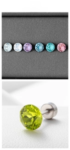 Macro detail of round-cut zircon screw-back earrings in vibrant candy colors