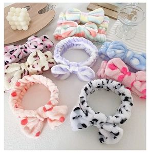 Variety of leopard and striped coral fleece bow headbands for face washing and makeup