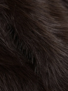 Macro shot of dark brown faux fur texture showing soft fibers and natural luster