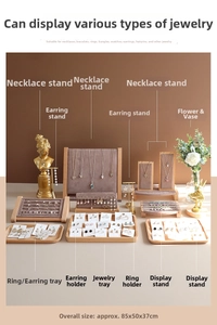 Detailed wood jewelry display set with brown velvet stands for necklaces and earrings