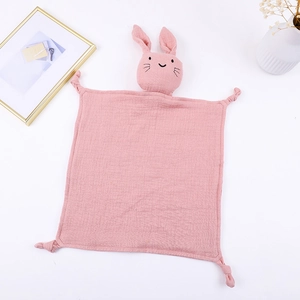 Pink cotton gauze baby security blanket with cute bunny head and knotted corners