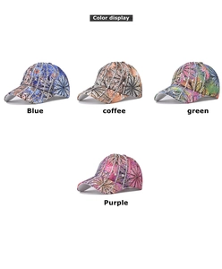 Detail of four colorful floral baseball caps featuring sparkling silver rhinestone chains