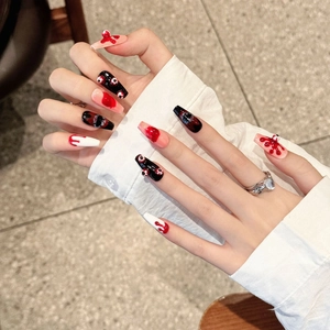 Hand-painted horror press-on nails with 3D eyeballs and blood splatter design