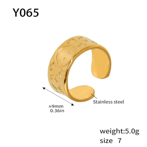 Detailed specs of the 9mm wide gold-plated stainless steel ring with smiley face and star