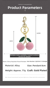Pink flocked cherry keychain with green leaves and gold-plated alloy clip for bags