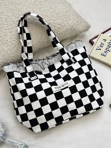 Checkered canvas tote bag with white lace trim and minimalist top handle design